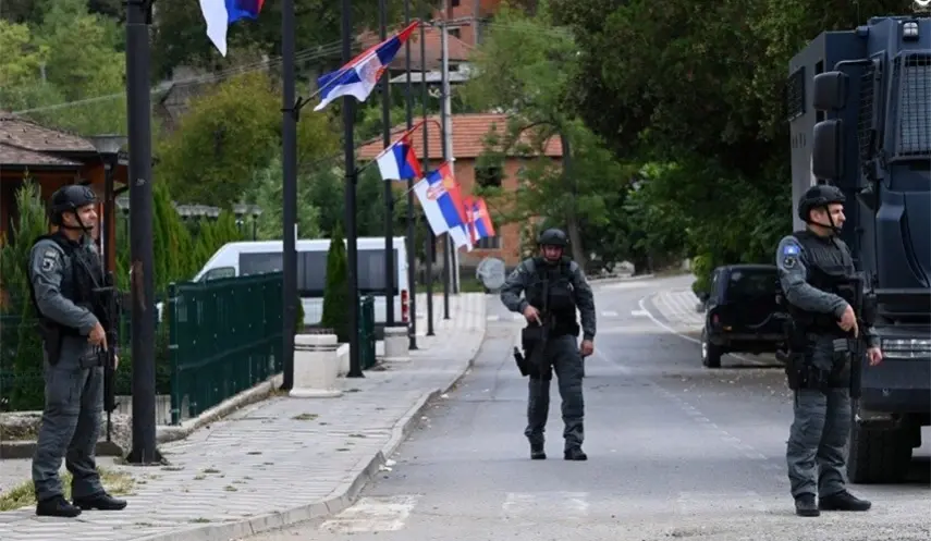 SO-CALLED KOSOVO POLICE TEAR DOWN FLAG OF SERB ASSOCIATION