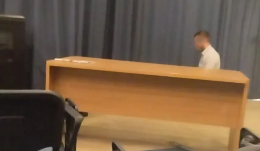 MAN PERFORMS ISLAMIC PRAYER IN JOURNALISTS' WORKSPACE