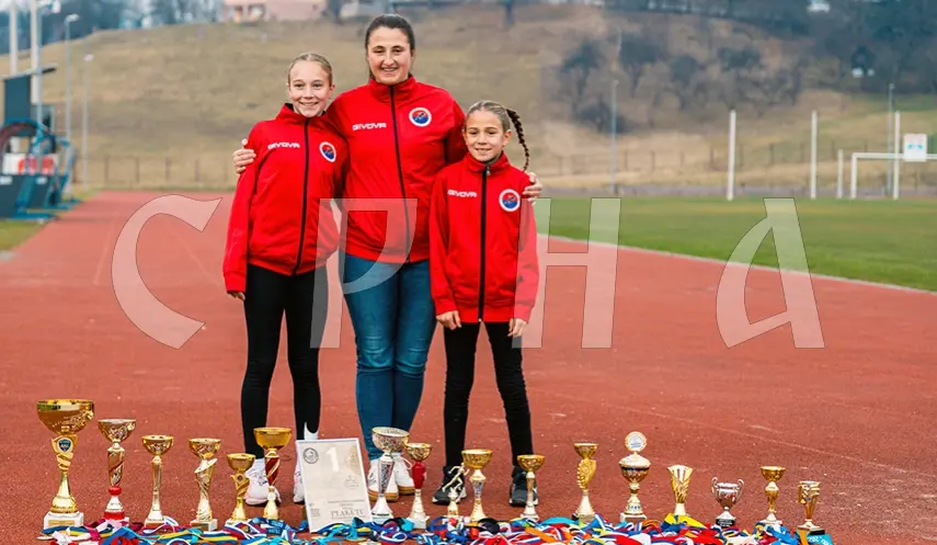 MEDAL-WINNING ANDREA AND SARA - PRIDE OF ATHLETIC CLUB