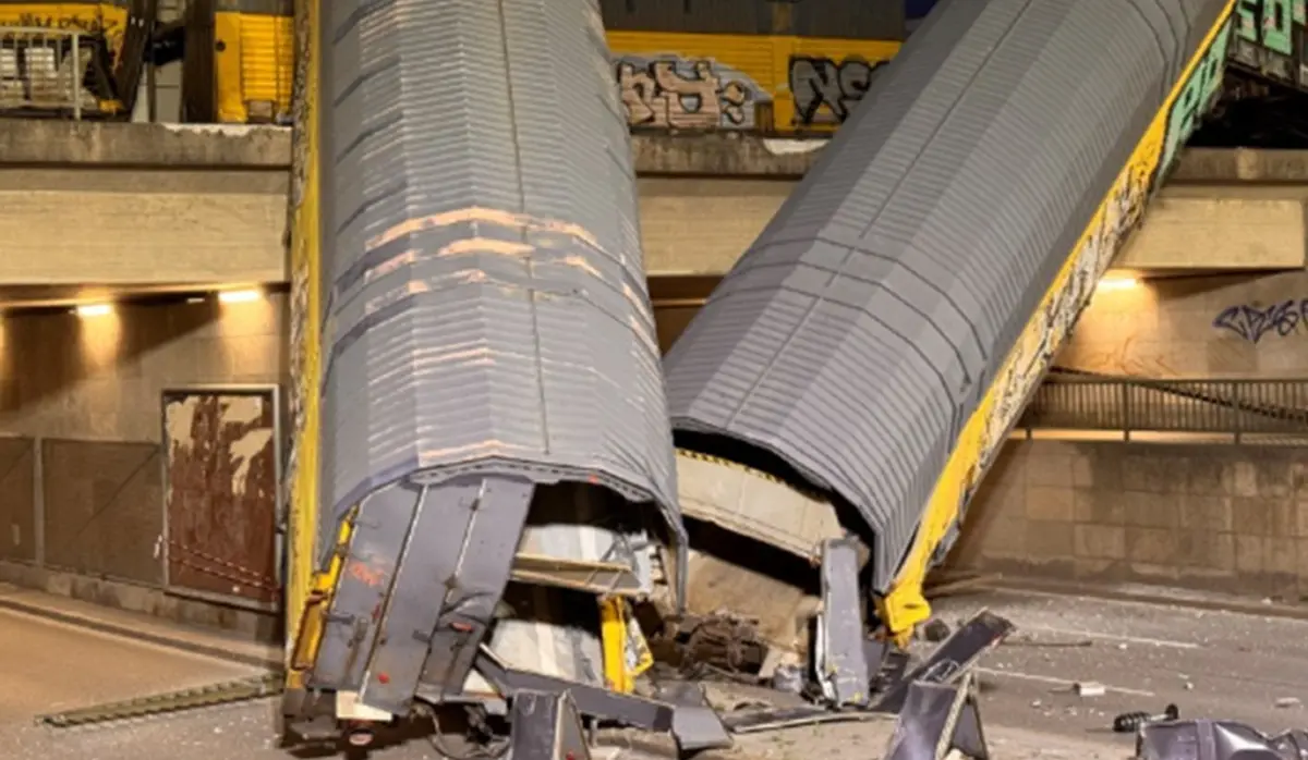 FREIGHT TRAIN FALLS FROM OVERPASS IN MUNICH