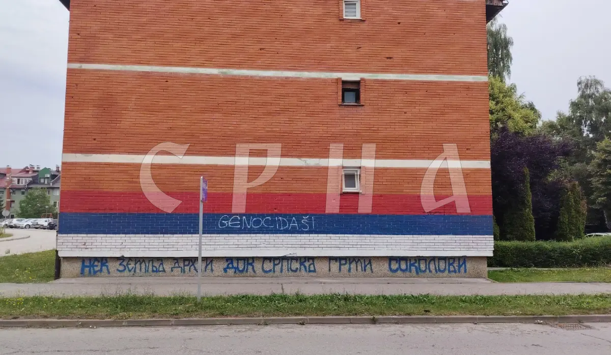 OFFENSIVE GRAFFITI TARGETING SERBS PAINTED ON APARTMENT BUILDING