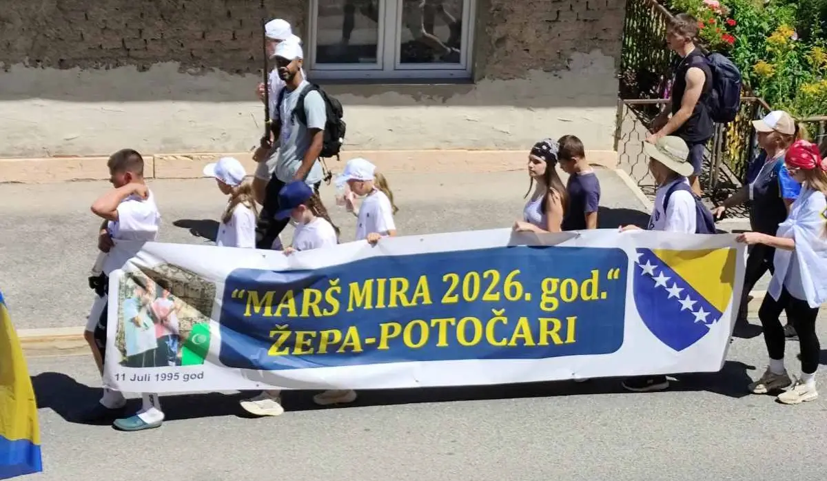 WHITE FLAGS WITH LILIES DISPLAYED DURING "MARCH OF PEACE"