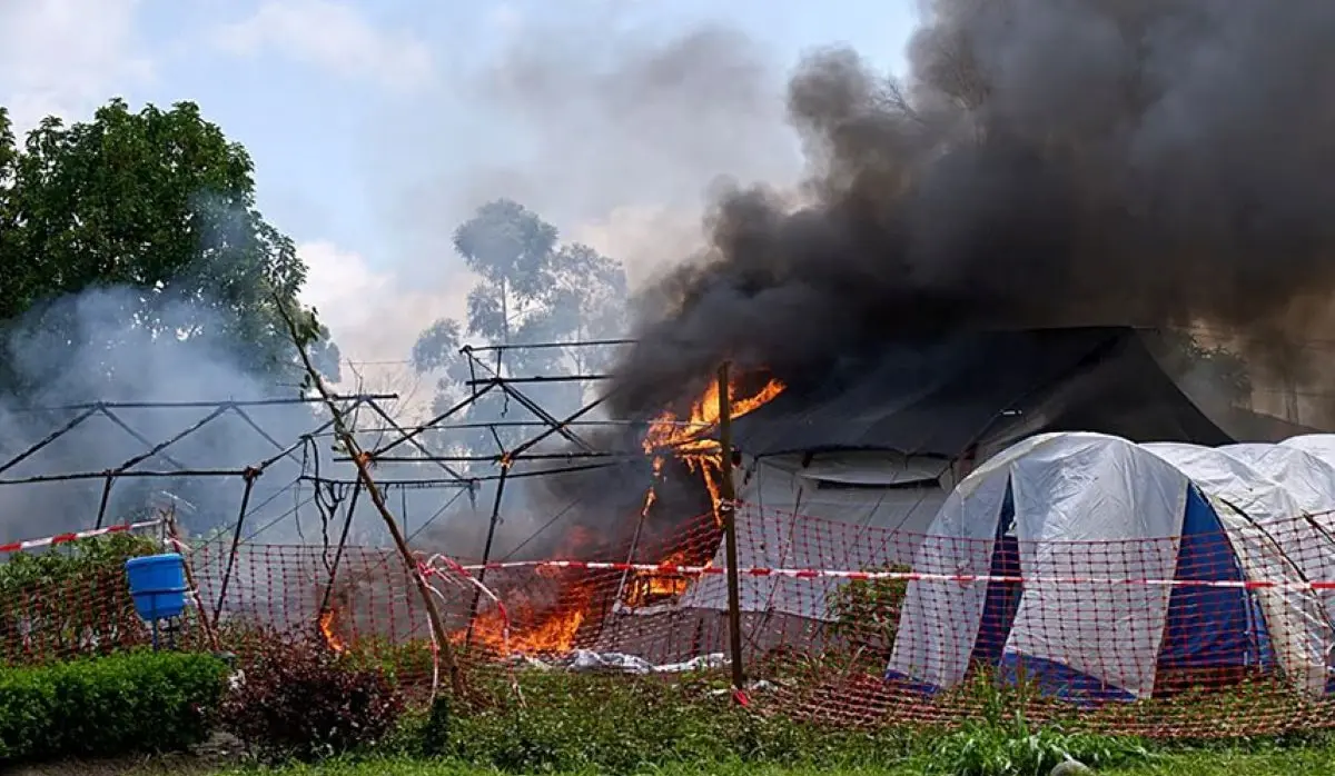 EBOLA TREATMENT CENTER SET ON FIRE, POLICE OFFICER KILLED