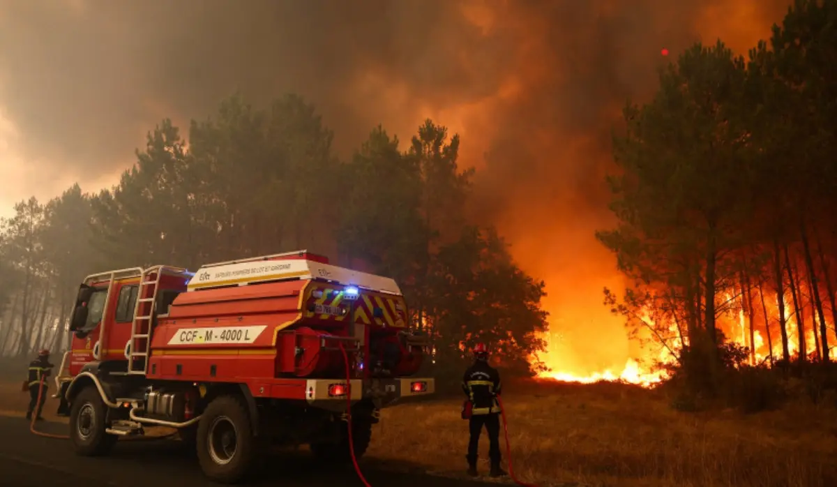MORE THAN 70,000 EVACUATED AS WILDFIRES SPREAD NEAR MADRID