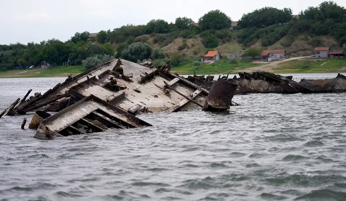 NAZI WARSHIPS EMERGE FROM THE DANUBE AS WATER LEVELS HIT RECORD LOWS