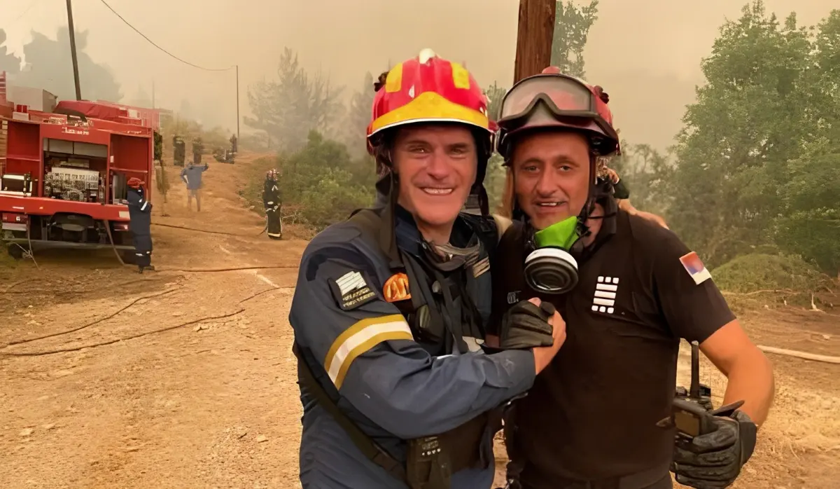 SERBIAN FIREFIGHTERS RETURN FROM FIGHTING FIRES IN FRANCE