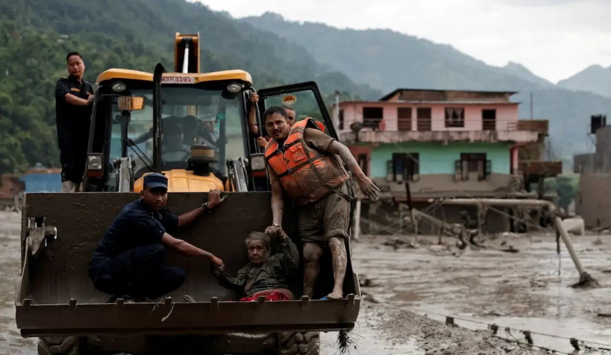 DEATH TOLL FROM FLOODS RISES TO 157