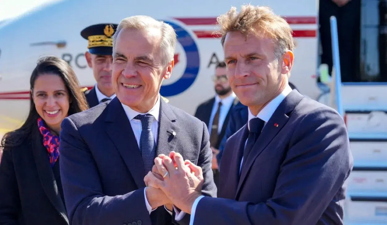 MACRON AND CARNEY SEEK CLOSER ECONOMIC TIES