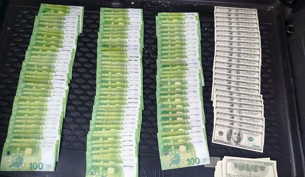 TWO SUSPECTS HELD IN COUNTERFEITING CASE