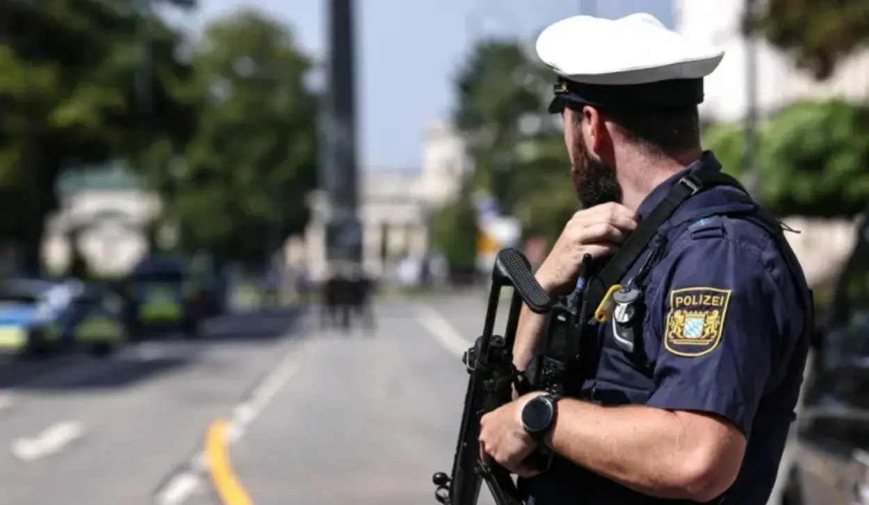 POLICE OPERATION UNDER WAY AFTER GUNMAN KILLS ONE, WOUNDS ANOTHER AND BARRICADES HIMSELF